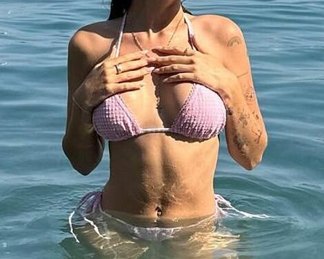 Sami Sheen, 20, poses in a pink bikini during Italy vacation