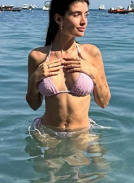 Sami Sheen, 20, poses in a pink bikini during Italy vacation