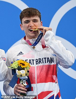 Lee celebrates his gold at the Tokyo Games in 2021