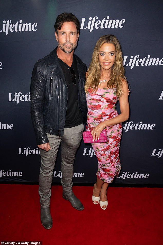 Denise Richards and her husband Aaron Phypers looked every inch the happy couple while enjoying a date night at the Los Angeles premiere of Tempted by Love