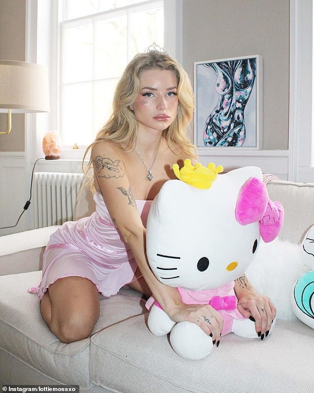 Lottie previously alleged she makes around £30,000 a month with her X-rated content (pictured: Lottie cuddling with a Hello Kitty in a pink slip dress)