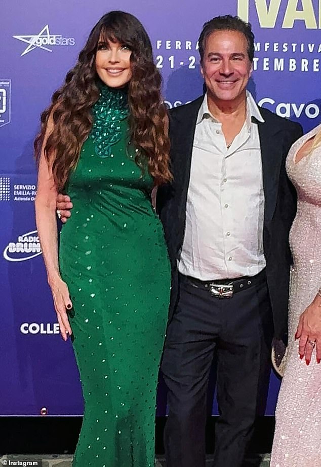 Sports Illustrated Swimsuit Edition cover veteran Carol Alt looked gorgeous in green on Sunday. The 5ft11in brunette bombshell from New York attended the F errara Film Festival in Italy. She had her arm around Joe Ienco