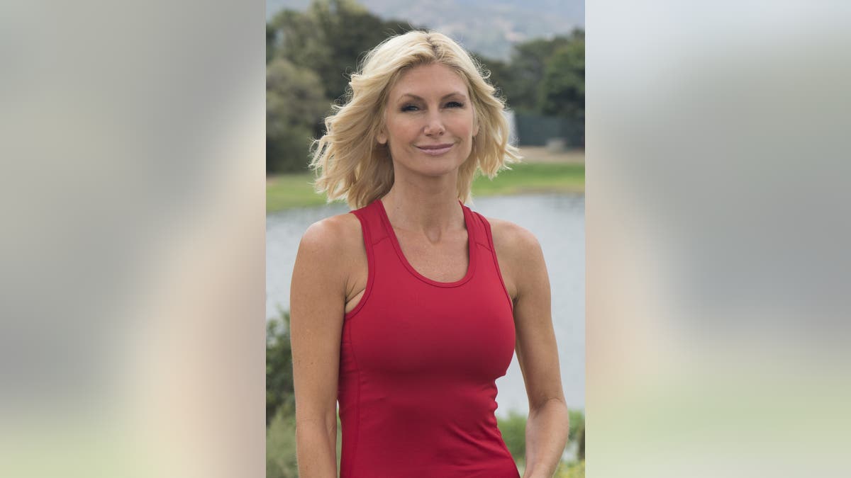 Brande Roderick in a red tank top