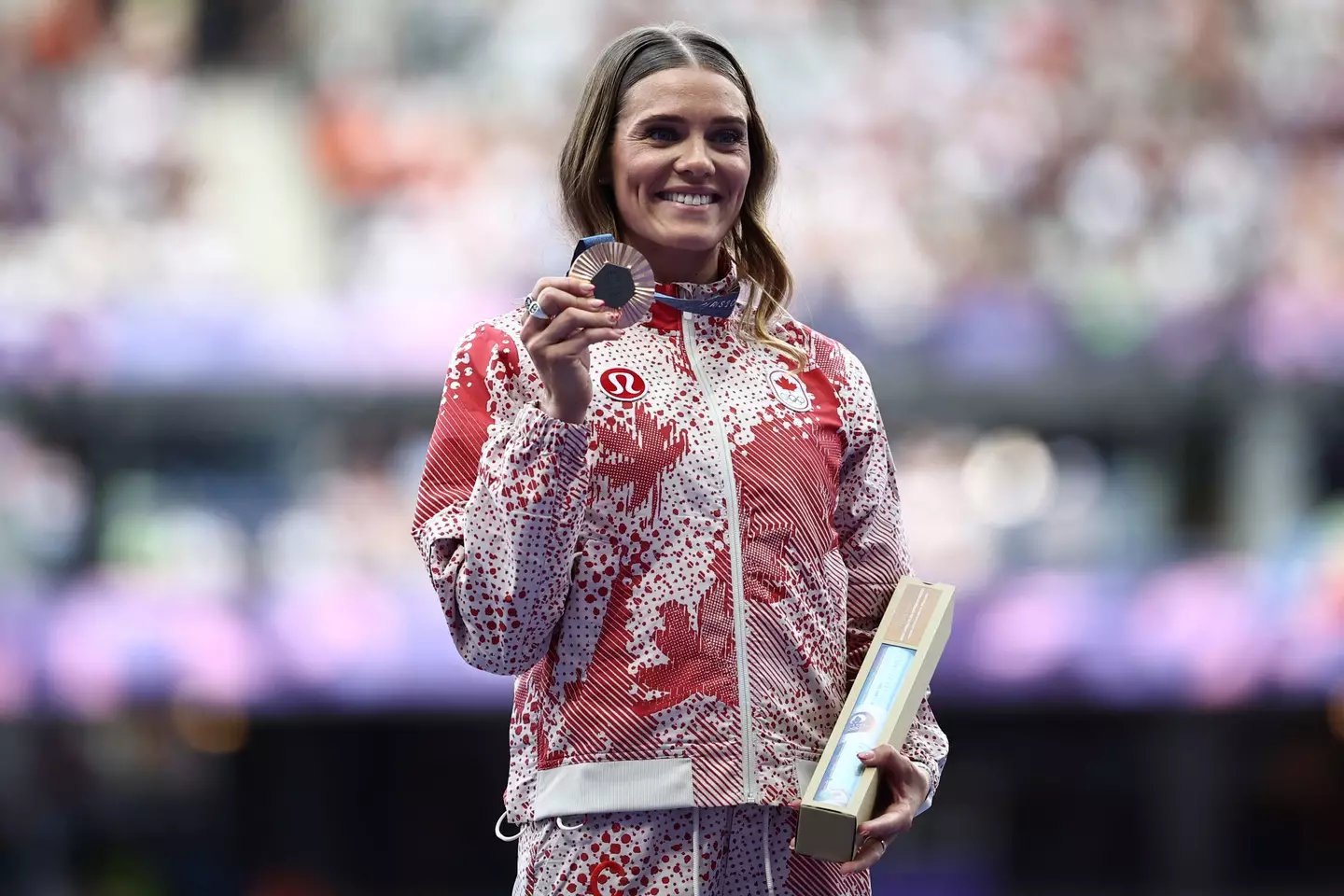 Alysha Newman poses with her bronze medal in Paris. (Image: Getty)