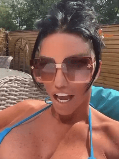 Double bankrupt Katie Price strips to barely-there blue bikini