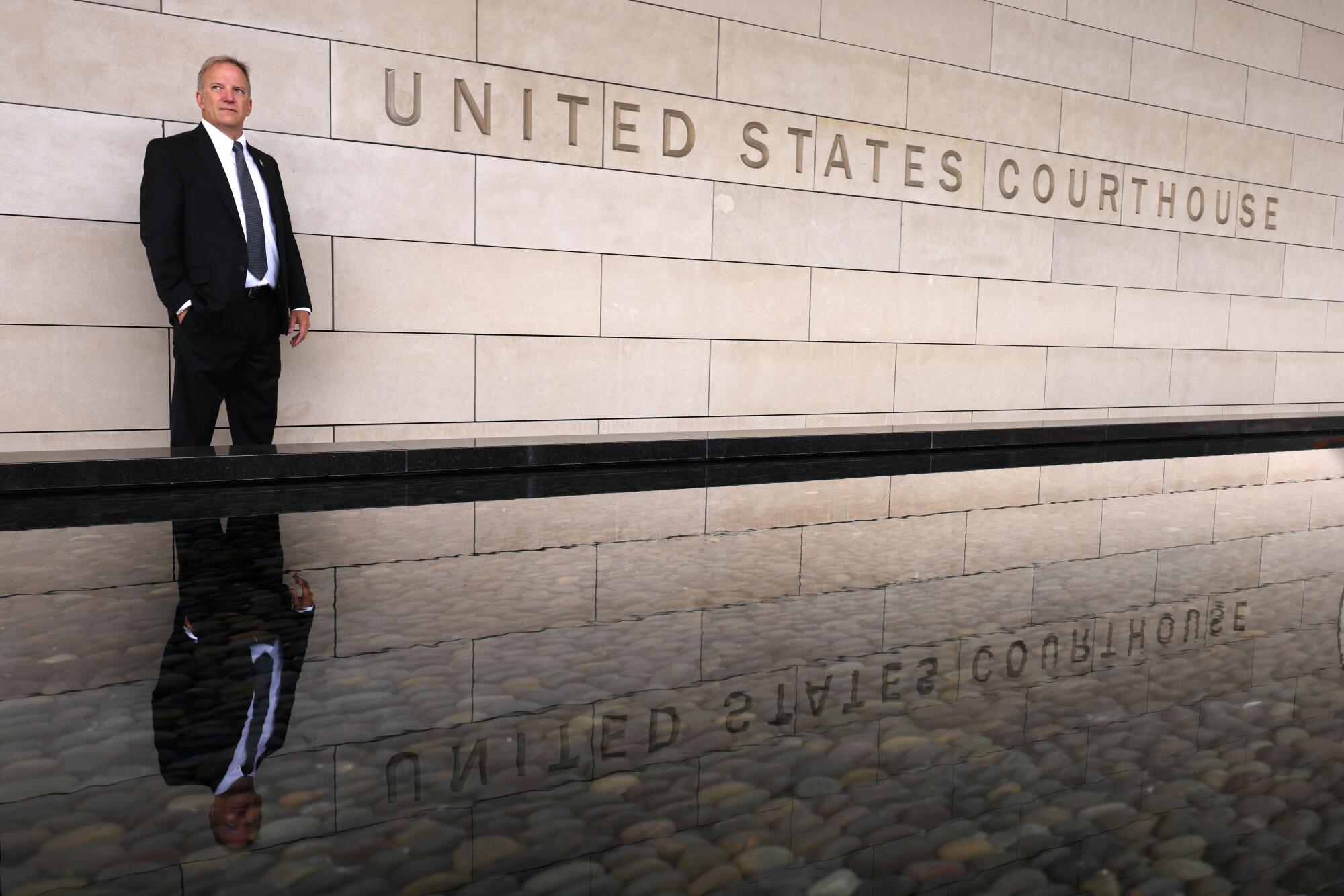 Ed Newcomer standing in front of the federal courthouse in downtown Los Angeles