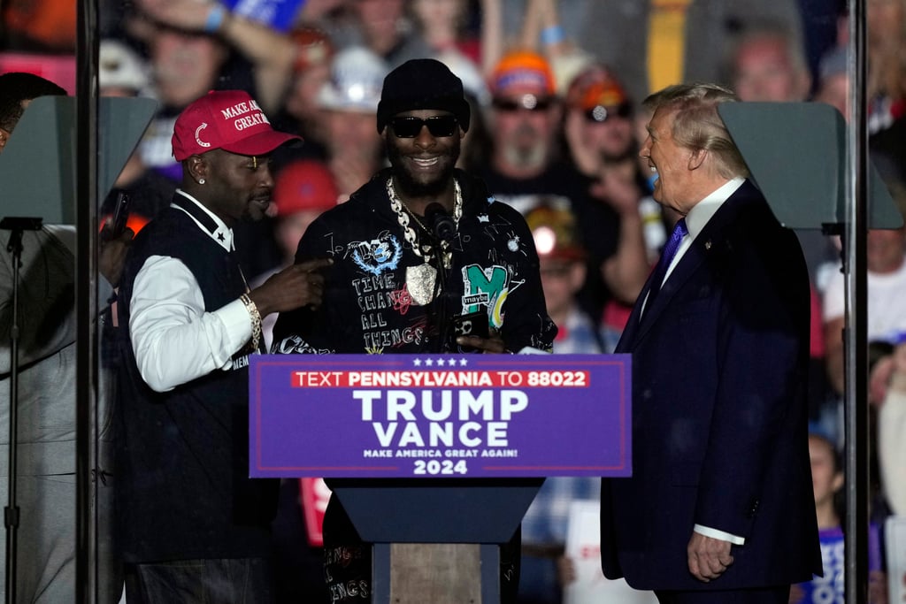 Antonio Brown, in a Maga cap, and Le’Veon Bell, both formerly with the Pittsburgh Steelers, with US presidential candidate Donald Trump at a campaign rally in Pennsylvania this month. Photo: AP Photo