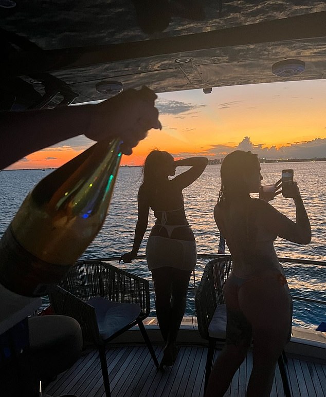 The final photo posted by Vieira shows her aboard a yacht just before sunset the day before her body was discovered