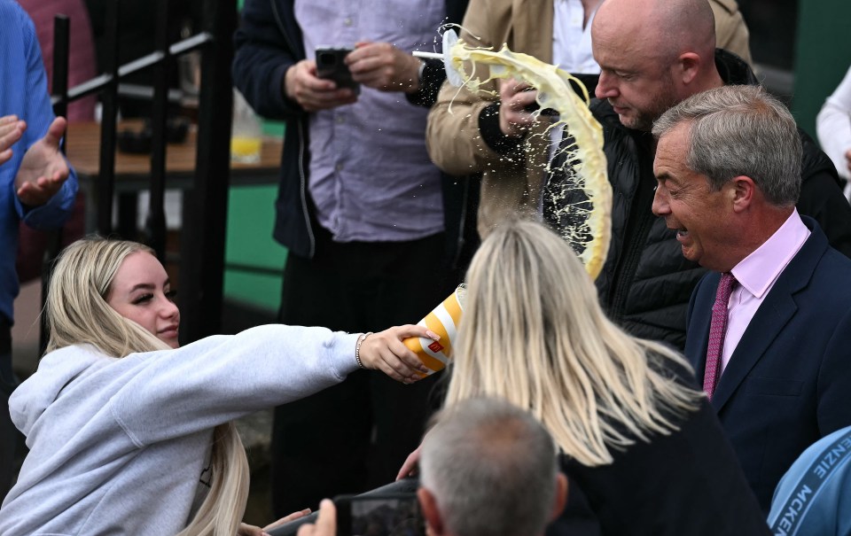 A milkshake was thrown at Nigel Farage during his general election campaign launch in Clacton-on-Sea