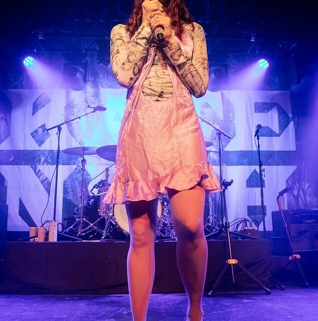 Kate Nash puts on a leggy display as she takes to the stage in Leeds