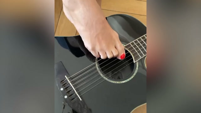 Lily Allen plays guitar with her feet as she returns to OnlyFans