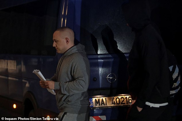 According to prosecutors, the Tate broters have spawned Romanian imitators. In June 2023, Vlad Obuzic (pictured during his arrest( and three other men were arrested in what a source at Romania's anti-organized crime prosecuting unit said  was 'a carbon copy of the Tate model'