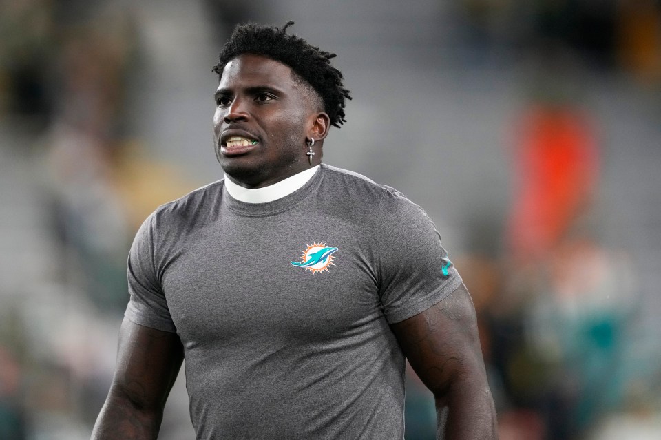 Tyreek Hill #10 of the Miami Dolphins warming up.