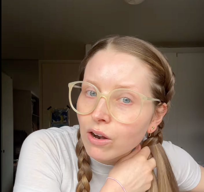 Jessie Cave braiding her hair