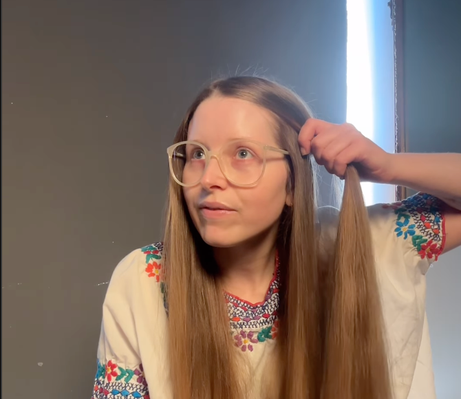 Jessie Cave holds her hair