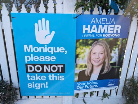 A Liberal corflute with another beside it saying, ‘Monique, please DO NOT take this sign!’