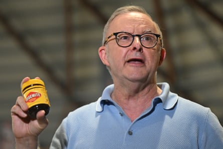 Albanese holds up a jar of Vegemite