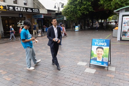 Scott Yung outside a strip of shops