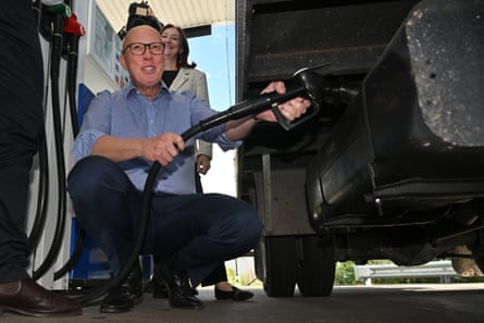 Dutton wields a petrol pump