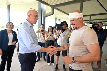 The men shake hands