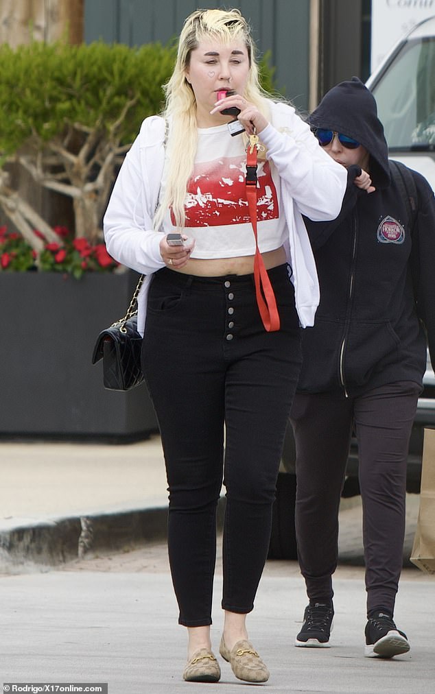 Amanda Bynes was spotted going for a walk in Los Angeles with a friend