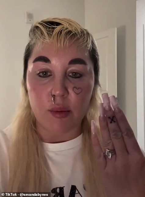 The 39-year-old actress showed off a brand new 'X' inking on her finger as well as her new hair in a video shared on TikTok