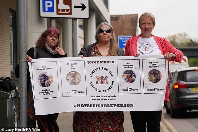 Three protesters outside Chelmsford Magistrates' Court at a previous hearing where Marsh appealed against Uttlesford District Council's decision